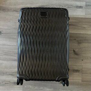 TUMI Check-In Luggage - 360 4-Wheel Spin - Charcoal Grey - Flaw Depicted